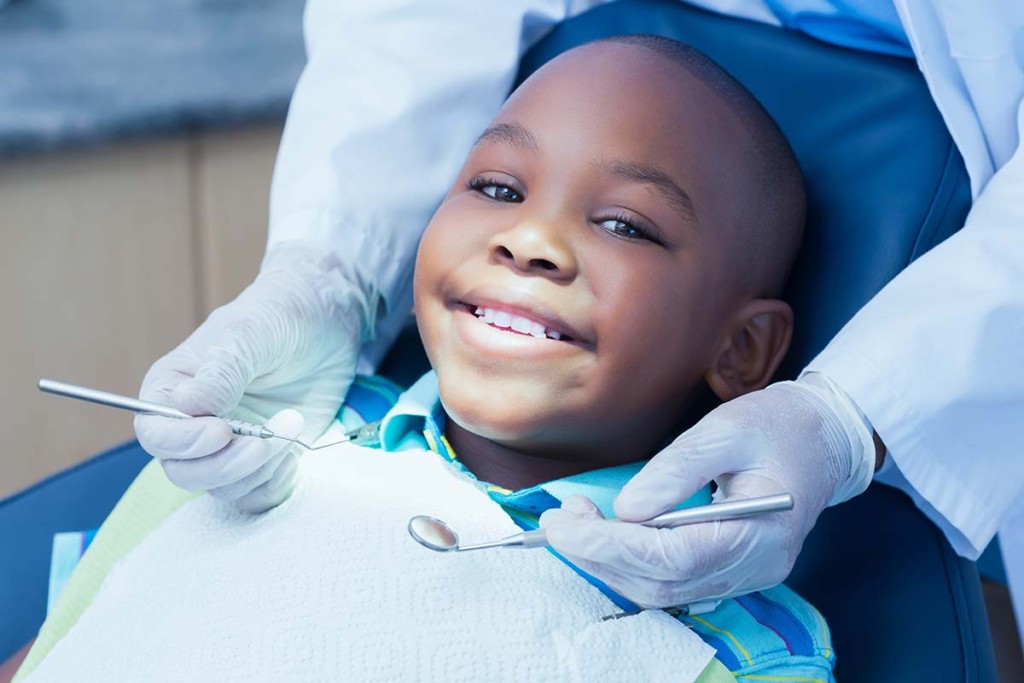  Boy Having His Teeth Examined Inside Mobile Dental Facility