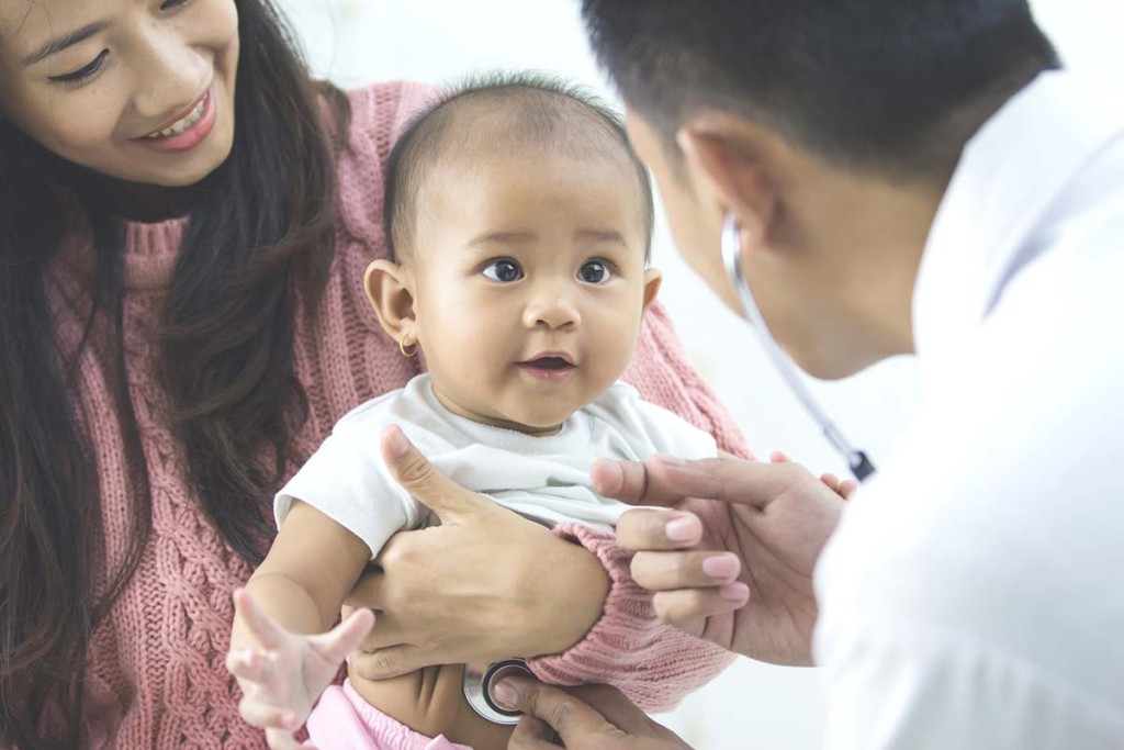  Doctor With Child Patient In Remote Mobile General Medicine Unit
