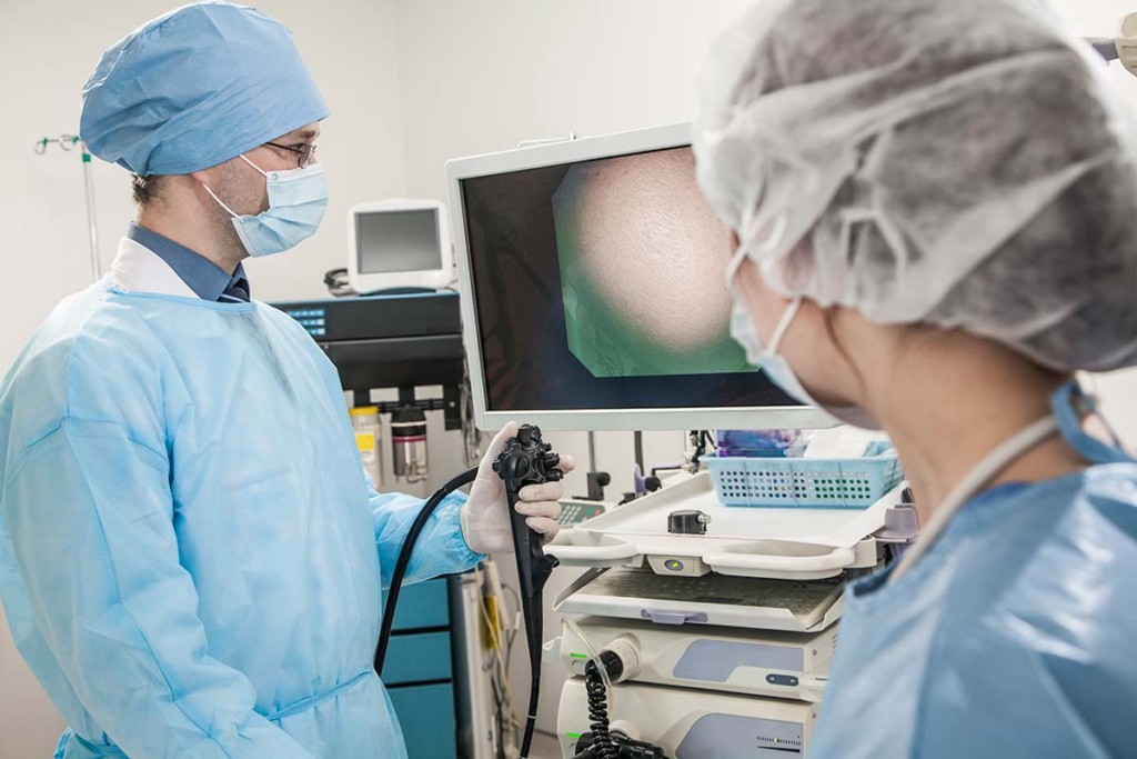  Doctor Performing Endocopic Procedure Inside Mobile Endoscopy Unit