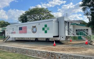 Timor Leste expanded facility with decorative wrap showing various symbols